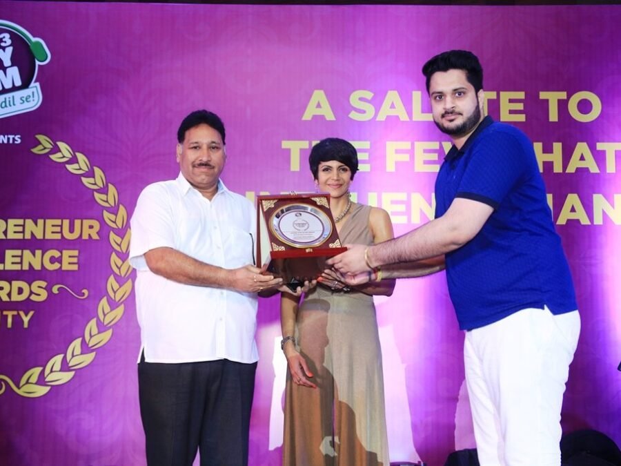 Entrepreneur Excellence Award being received by Divine Group